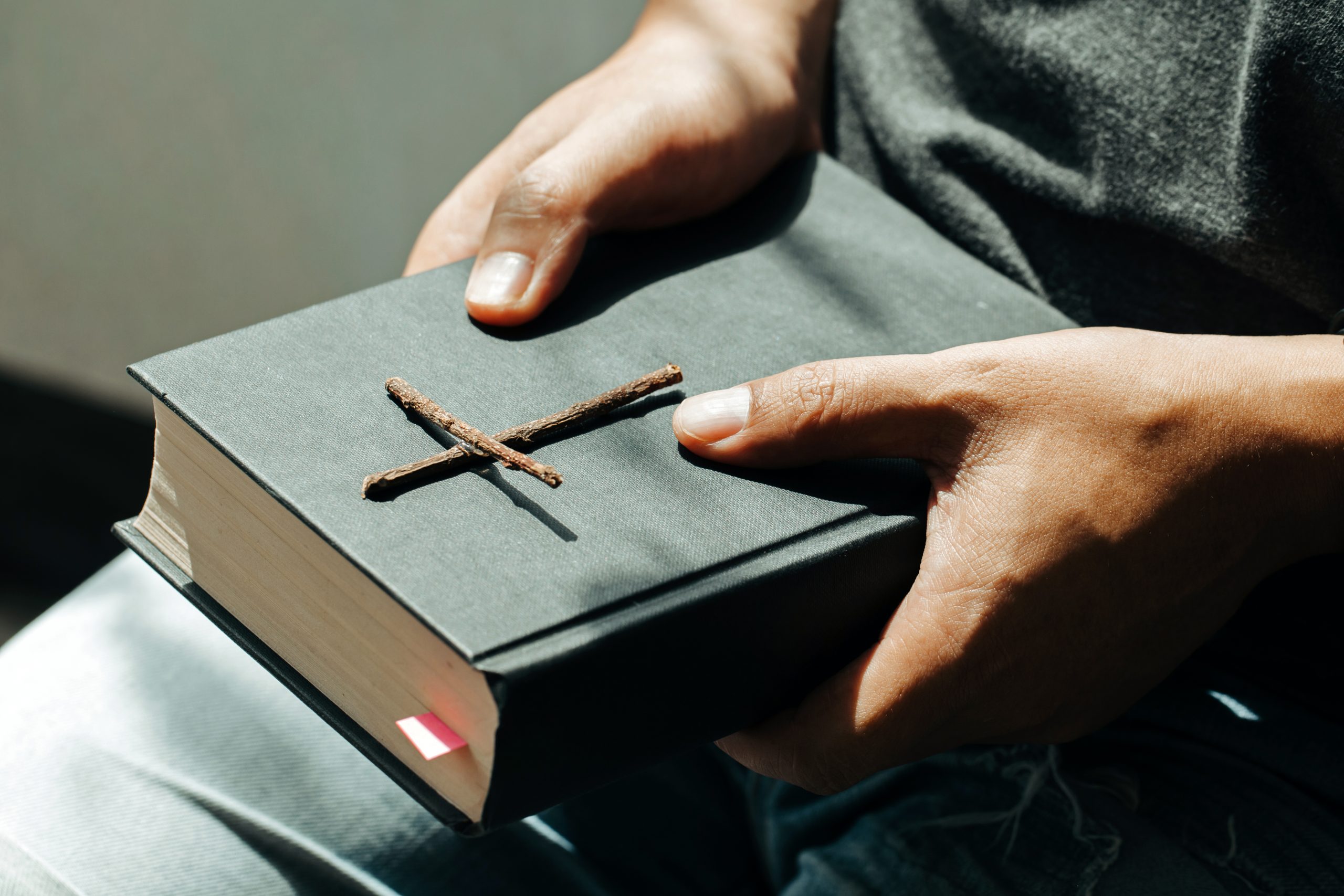 Man Sitting Hold Bible